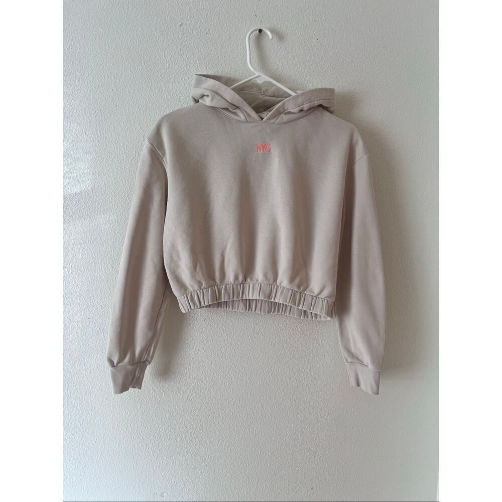 H&M cropped beige hoodie with "NYC" embroidered Size 10-12 Y